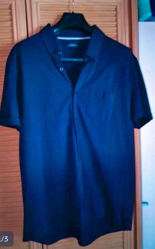 Camisa Polo Azul Dustin.