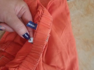 Pantaloncini bimbo arancioni con tasche