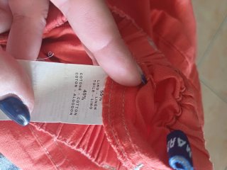 Pantaloncini bimbo arancioni con tasche