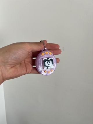 Tamagotchi clicker efecto cristal morado