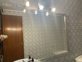 Espejo de baño plateado
