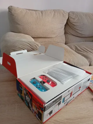 Lote Nintendo Switch + Mando de Zelda + 7 Juegos