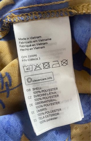 Camisa H&M flores azul y cobre