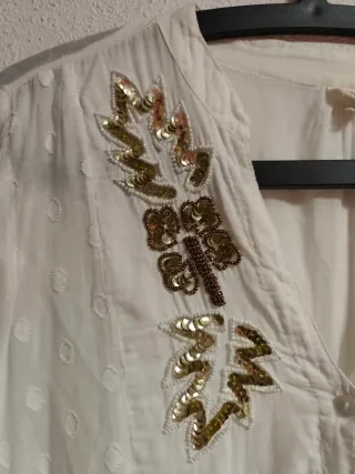 Vestido corto de chica en la talla M/L.