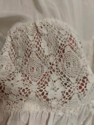 Vestido corto de chica en la talla M/L.