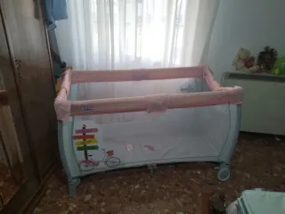 Cuna de viaje rosa