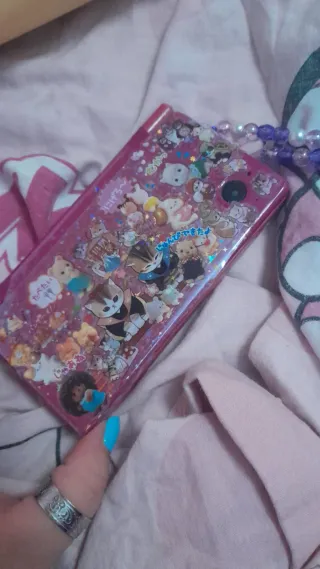 Nintendo DSi multicolor decorada