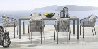 Conjunto mesa y sillas exterior gris