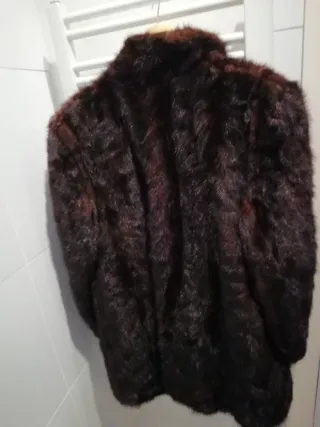 2 Abrigos de piel de bisonte auténtica