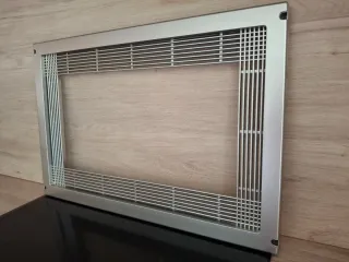 Embellecedor frontal metálico microondas