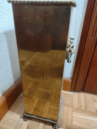 Paragüero vintage de metal dorado