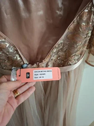 Vestido de fiesta dorado y rosa