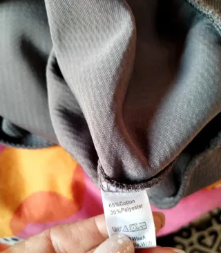 Maglia grigia con pizzo nero