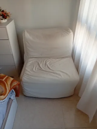 Está en Benidorm. Sillón cama gris
