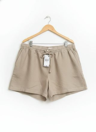 Pantalones cortos de lino beige