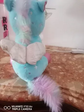Peluche unicorno azzurro con stelle