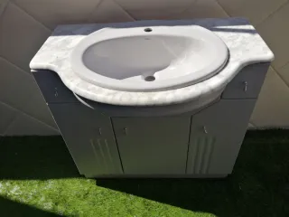 Mueble de baño con lavabo de mármol