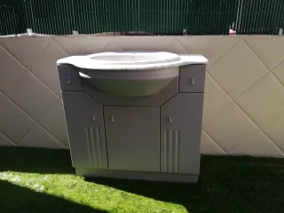 Mueble de baño con lavabo de mármol