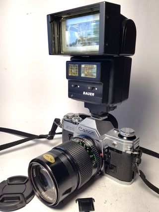 Canon AE-1 + Lente FD 135mm f/2.8 Y mas