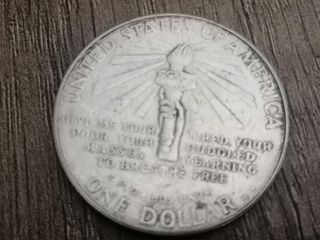 Moneda Ellis Island 1906