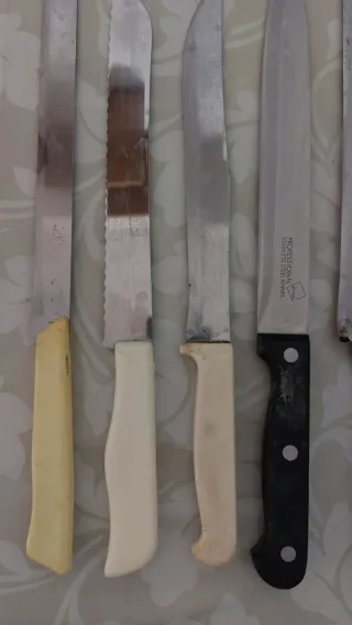 Set 9 coltelli affettati/carne/pane anni 80 Vintag