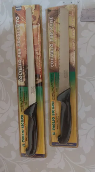 Set 9 coltelli affettati/carne/pane anni 80 Vintag