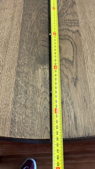 Mesa redonda de madera con 4 sillas