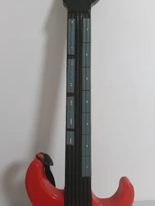 Guitarra Roja con Diseño de Llamas