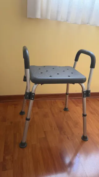 Silla de ducha con asas