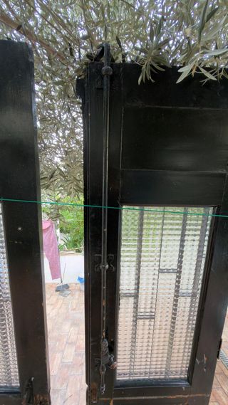 Puertas de portal de madera con cristal