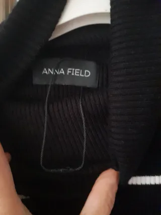 Maglione a collo alto a righe