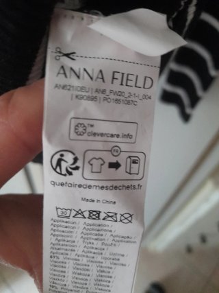 Maglione a collo alto a righe