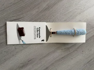 Coltello per torta blu e argento