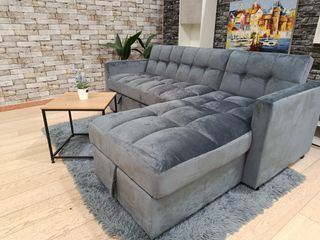 Sofá cama gris con arcón