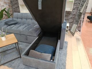 Sofá cama gris con arcón