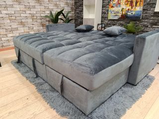 Sofá cama gris con arcón