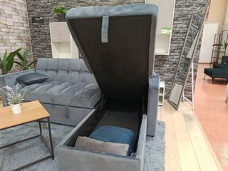 Sofá cama gris con arcón
