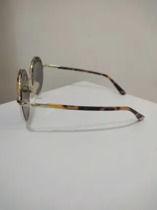 Occhiali da sole Vespa tondi oro lenti blu