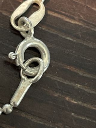 Collana con pendente romboidale