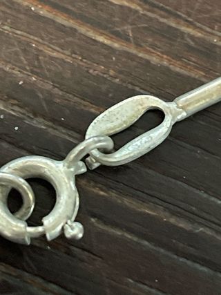 Collana con pendente romboidale