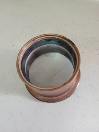 Lupa antigua de latón y cristal