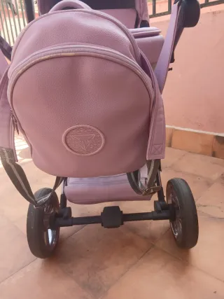 Carro de bebé rosa