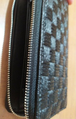 Portafoglio donna nero intrecciato con zip