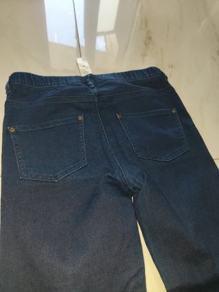 Pantaloni tipo leggings con zip alla caviglia
