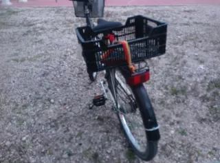 Bicicleta Hércules con cesta y portabultos
