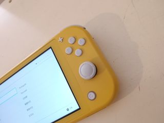 Nintendo Switch Lite Amarilla + Funda