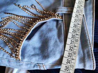Jeans con cascate di Swarovski