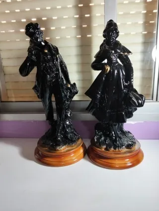 Figuras de lujo antiguas hombre y mujer