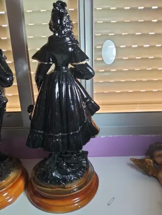 Figuras de lujo antiguas hombre y mujer