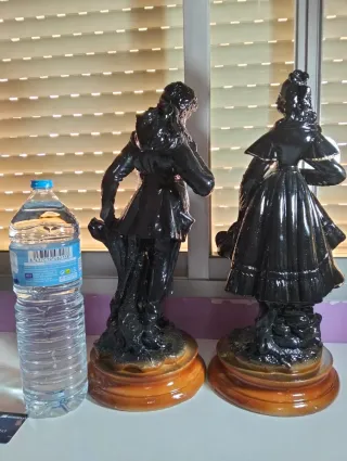 Figuras de lujo antiguas hombre y mujer